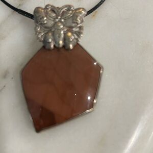 Stephen Dweck   with a butterfly at the top and Catalina stone